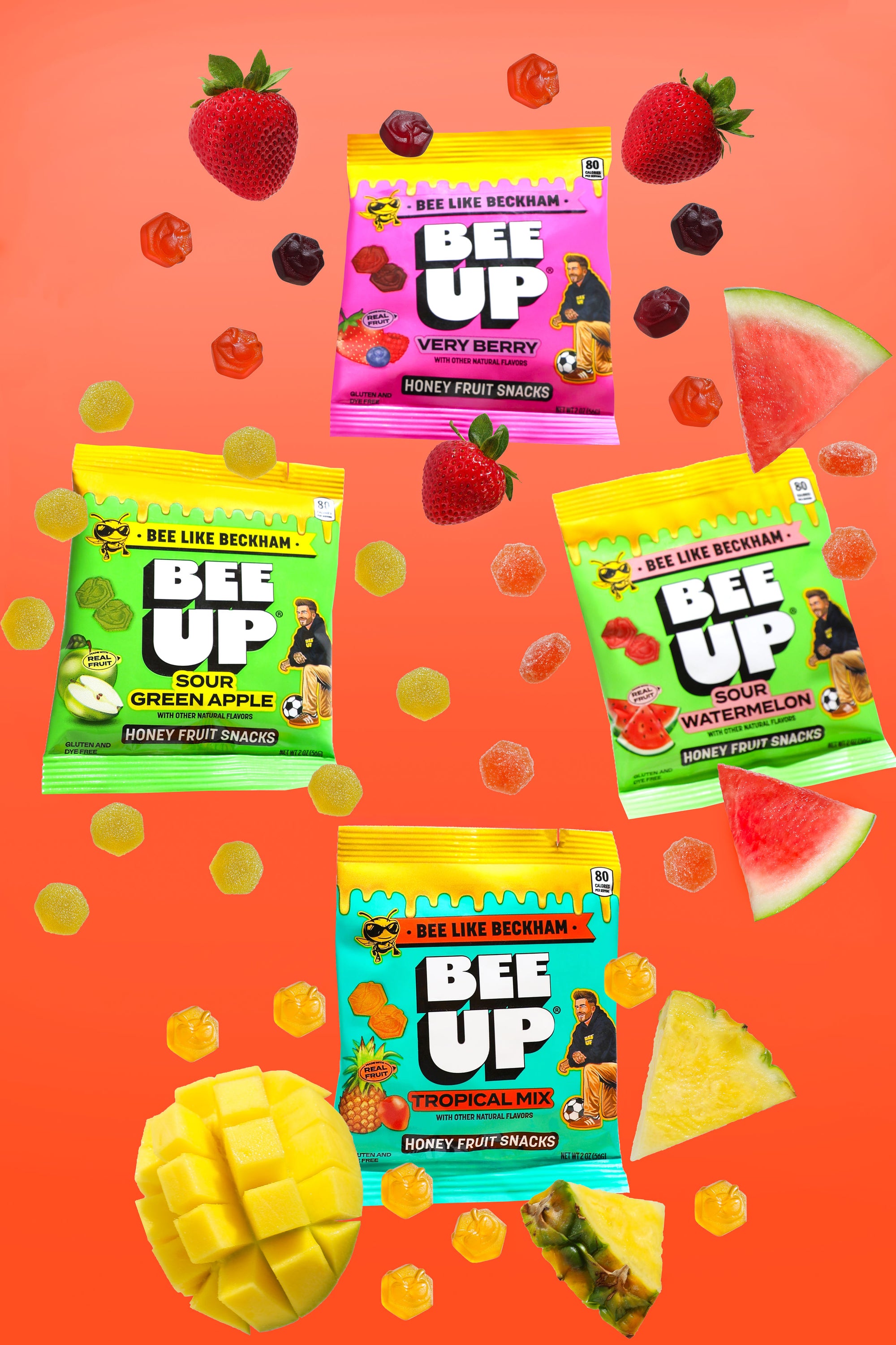 Bee Up honey fruit snacks in various flavors on a colorful background with fruits.